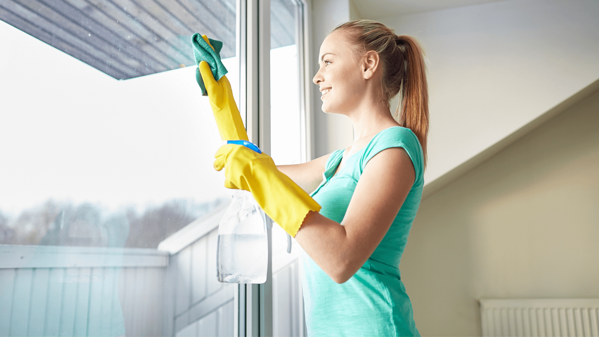 Woman Cleaning Window